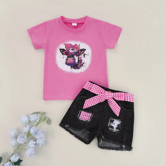 Pink Cow Shirt with Black Denim Shorts